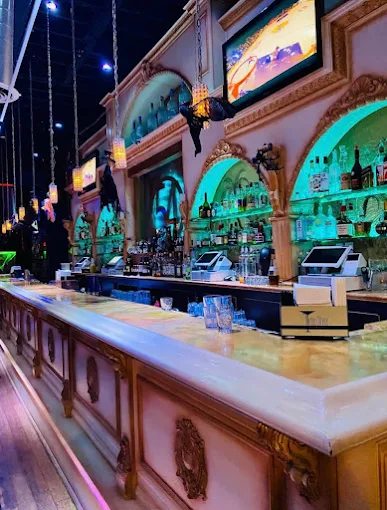 Inside Club 54, a brightly lit bar and lounge